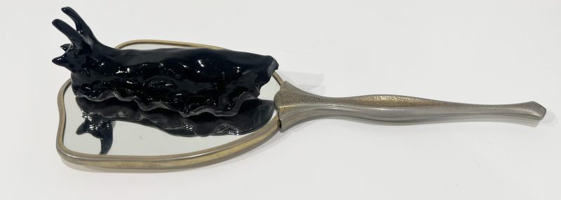 Tai Snaith 'Flotilla (there’s no dignity in haste) 11' 2025 glazed black midfire ceramic and vintage mirror 33 x 13 x 8 cm $550