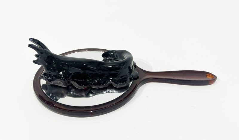 Tai Snaith 'Flotilla (there’s no dignity in haste) 10' 2025 glazed black midfire ceramic and vintage mirror 29 x 17 x 7 cm $770