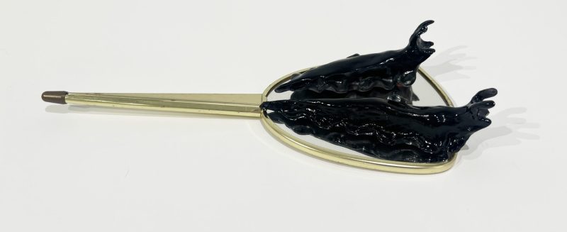 Tai Snaith 'Flotilla (there’s no dignity in haste) 14' 2025 glazed black midfire ceramic and vintage mirror 33 x 14.5 x 5.5 cm $550