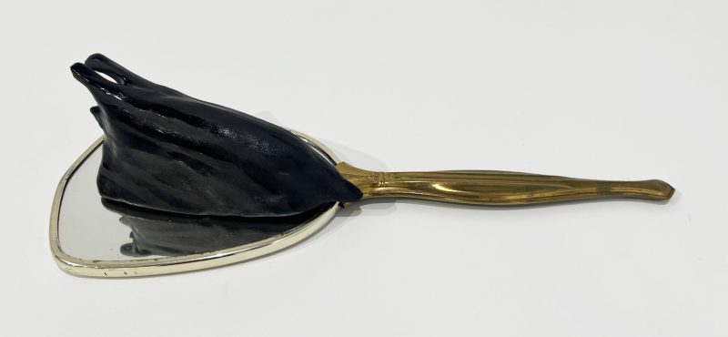 Tai Snaith 'Flotilla (there’s no dignity in haste) 15' 2025 glazed black midfire ceramic and vintage mirror 33 x 13 x 8 cm $550
