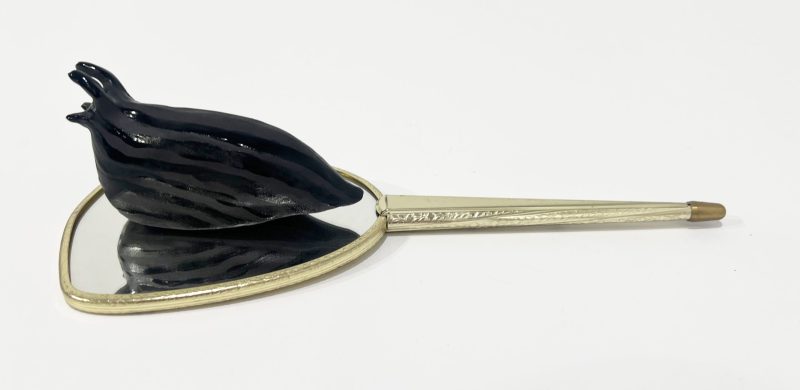 Tai Snaith 'Flotilla (there’s no dignity in haste) 16' 2025 glazed black midfire ceramic and vintage mirror 33 x 13 x 8 cm $550