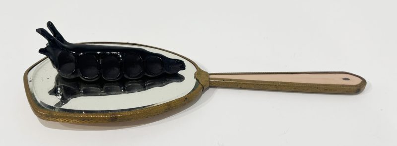 Tai Snaith 'Flotilla (there’s no dignity in haste) 18' 2025 glazed black midfire ceramic and vintage mirror 13 x 12 x 6 cm $440
