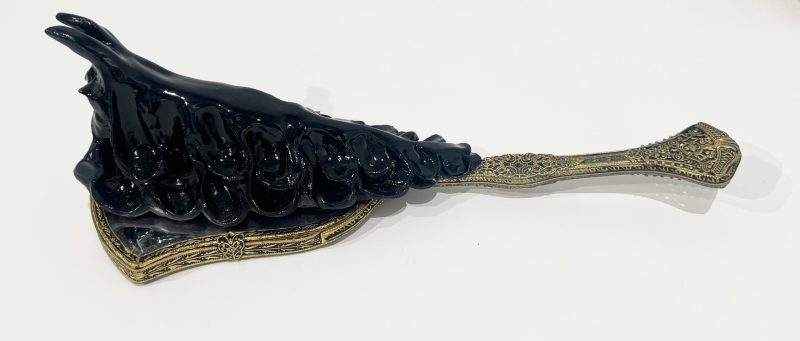 Tai Snaith 'Flotilla (there’s no dignity in haste) 3' 2025 glazed black midfire ceramic and vintage mirror 32.5 x 13 x 10 cm $770