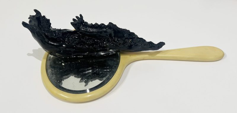 Tai Snaith 'Flotilla (there’s no dignity in haste) 4' 2025 glazed black midfire ceramic and vintage mirror 35.5 x 20.5 x 9 cm $770