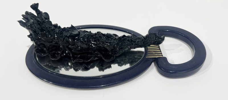 Tai Snaith 'Flotilla (there’s no dignity in haste) 5' 2025 glazed black midfire ceramic and vintage mirror 26 x 14.5 x 8 cm $770
