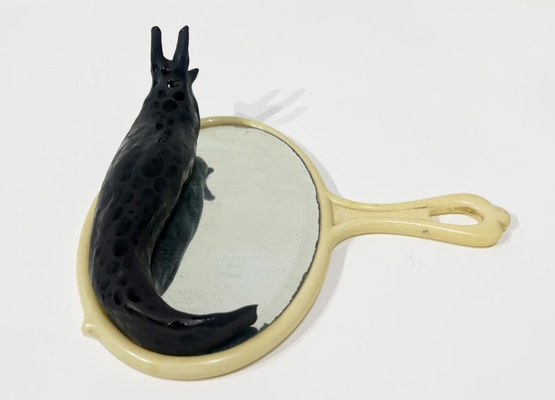 Tai Snaith 'Flotilla (there’s no dignity in haste) 8' 2025 glazed black midfire ceramic and vintage mirror 23 x 25 x 7.5 cm $770