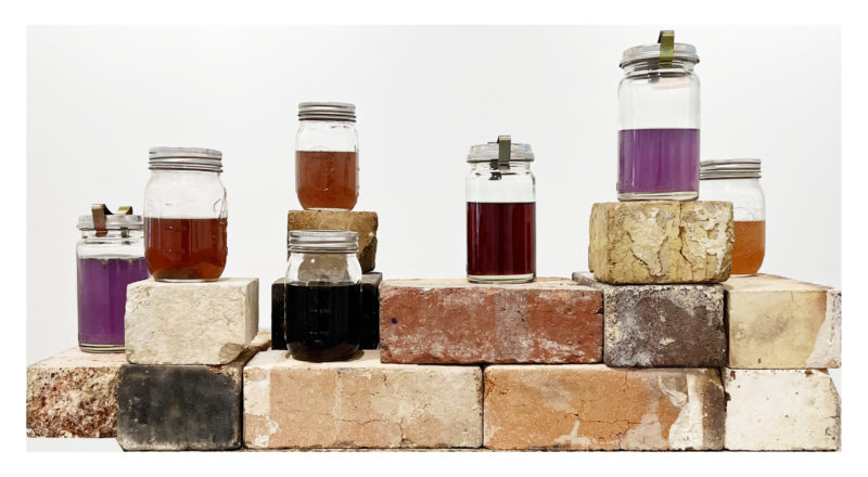 Kylie Banyard 'Bubble fume (with Hal Banyard-Coyte)' 2022 glass jars, metal lids, reclaimed kiln bricks, Australian wild flowers and water; dimensions variable